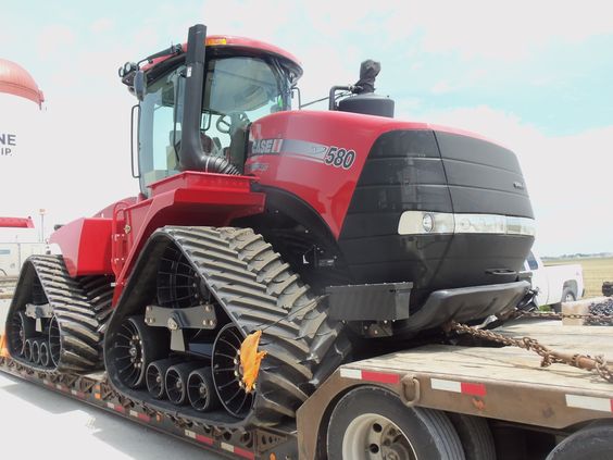 Case Tractor loaded on a low boy Heavy Equipment Shipping