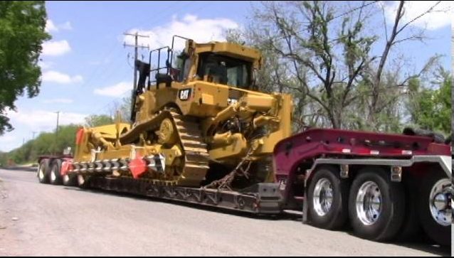 Caterpillar loaded on a low boy for transport 